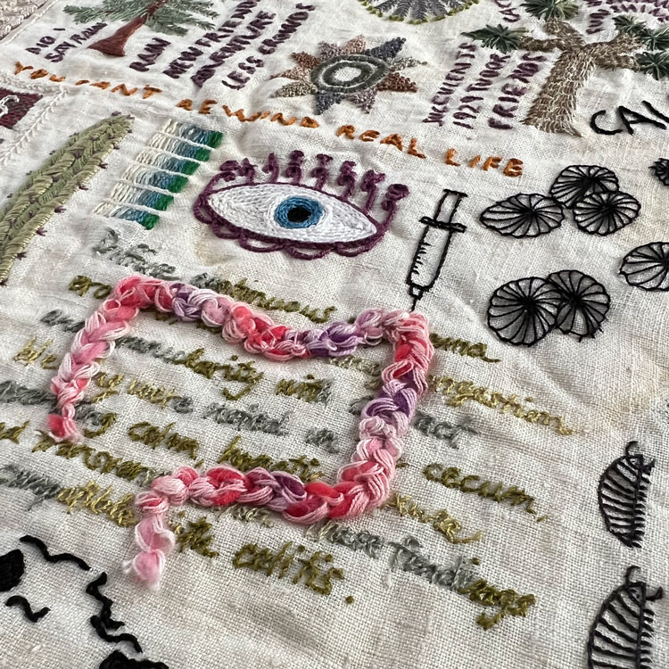 Detail of He Is Who He Is Embroidery