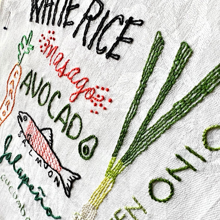 Detail of Oliver's Poke Bowl Order embroidery